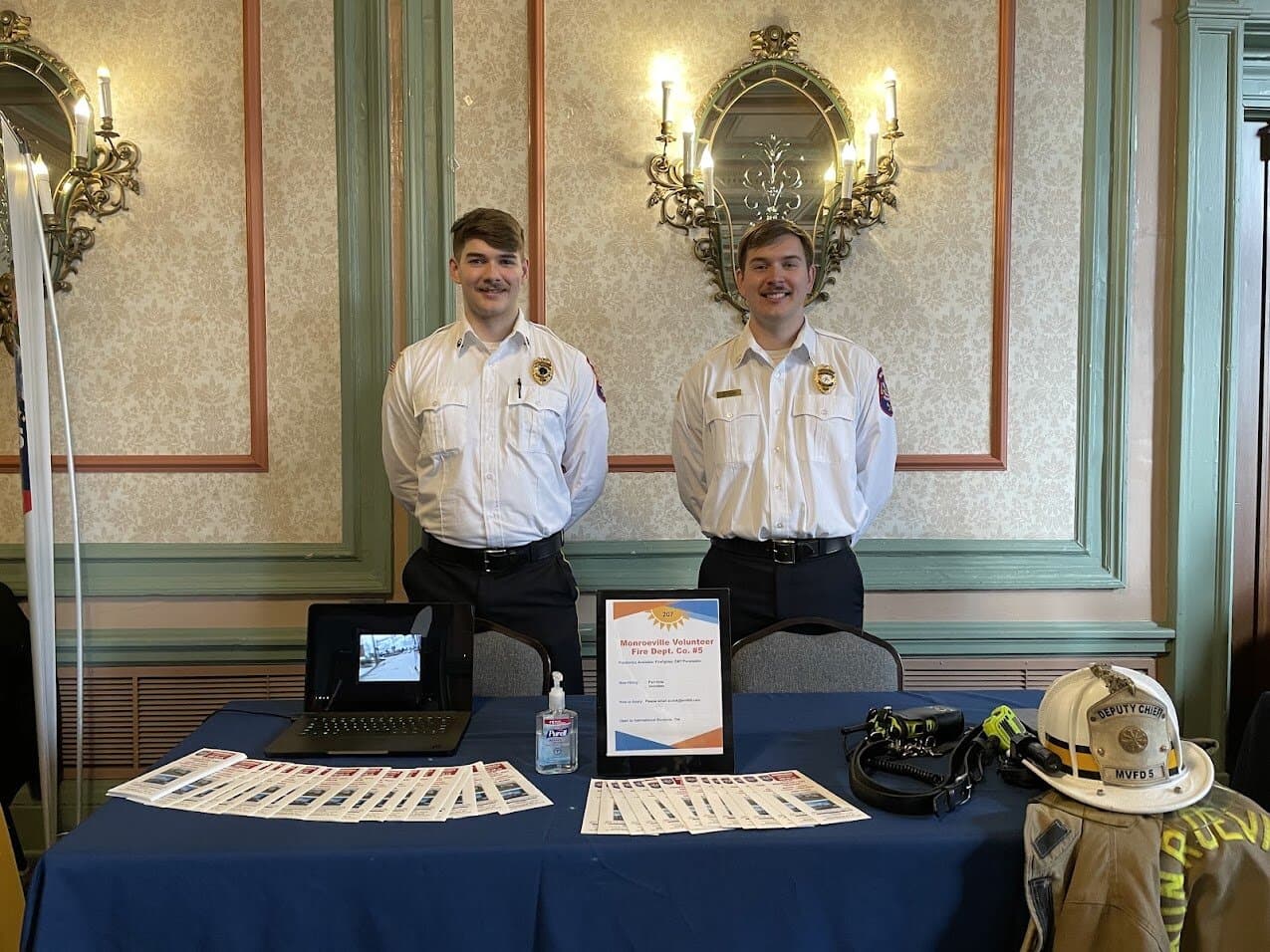 Two members at a Company 5 recruitment table
